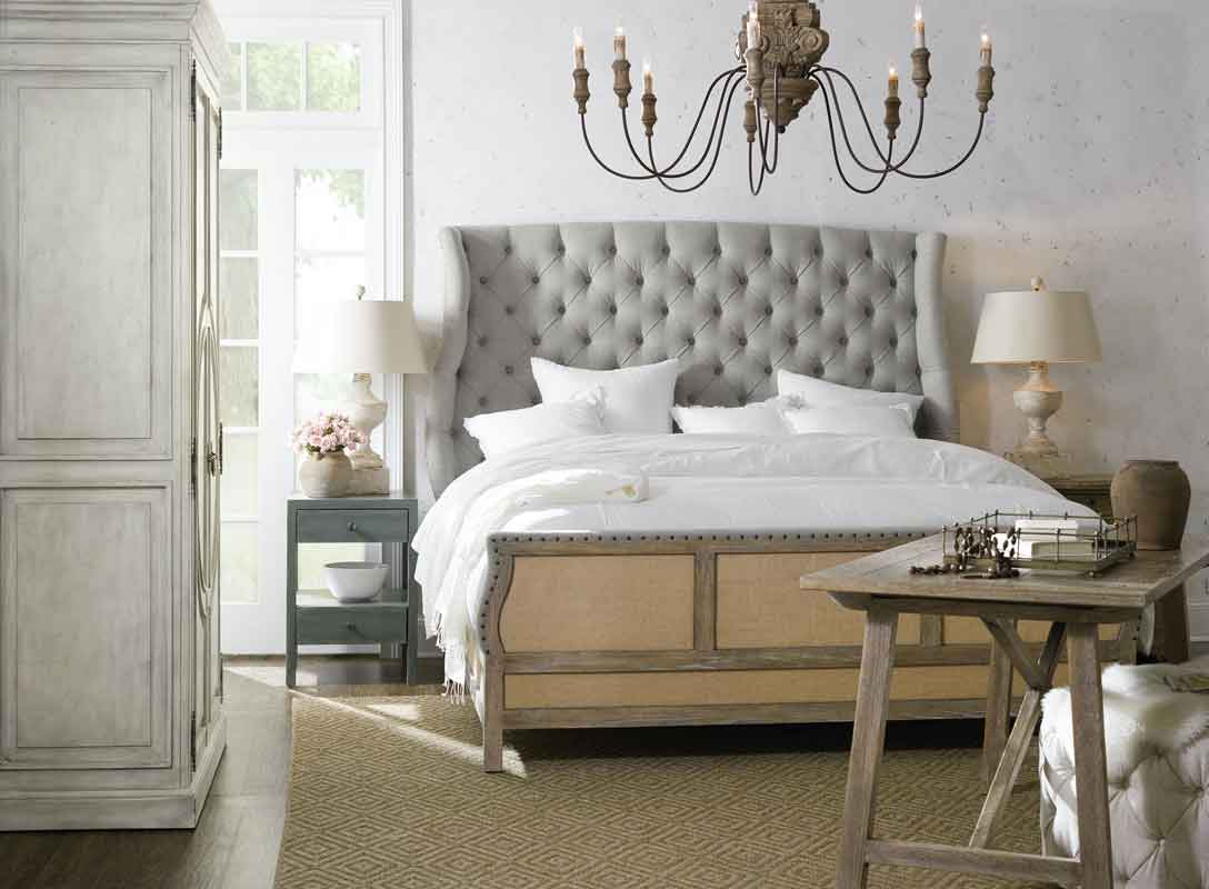 grey fabric bed with wooden details on its bottom and low legs, high capitone grey fabric headboard simple wooden vintage bed, kapitone krevati me psili kerfalaria kai xilines leptomeries,