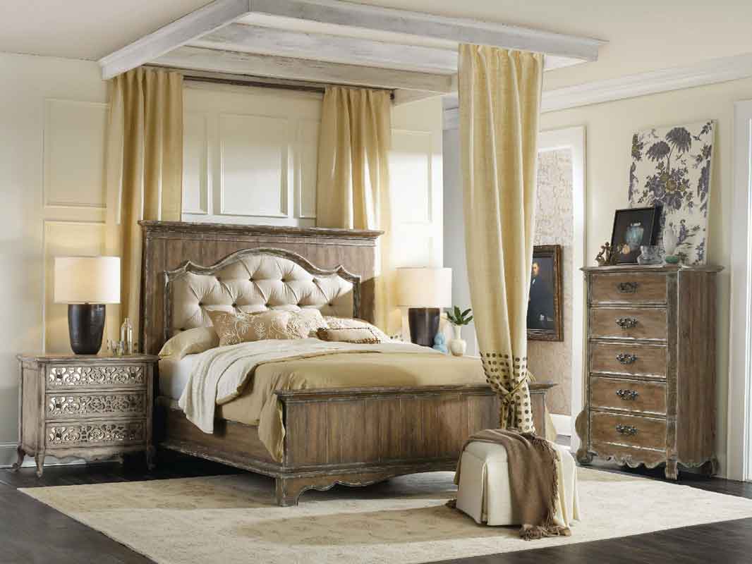 grey wooden capitone high headboard bed beige colors and low legs,