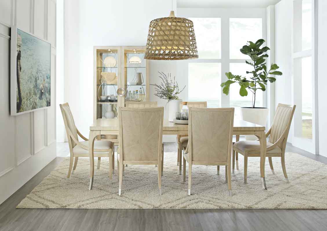 rectangular dinning table clean minimal desgn with silver detail on its leg, minimal style dinning chair beige wooden italian chairs, 