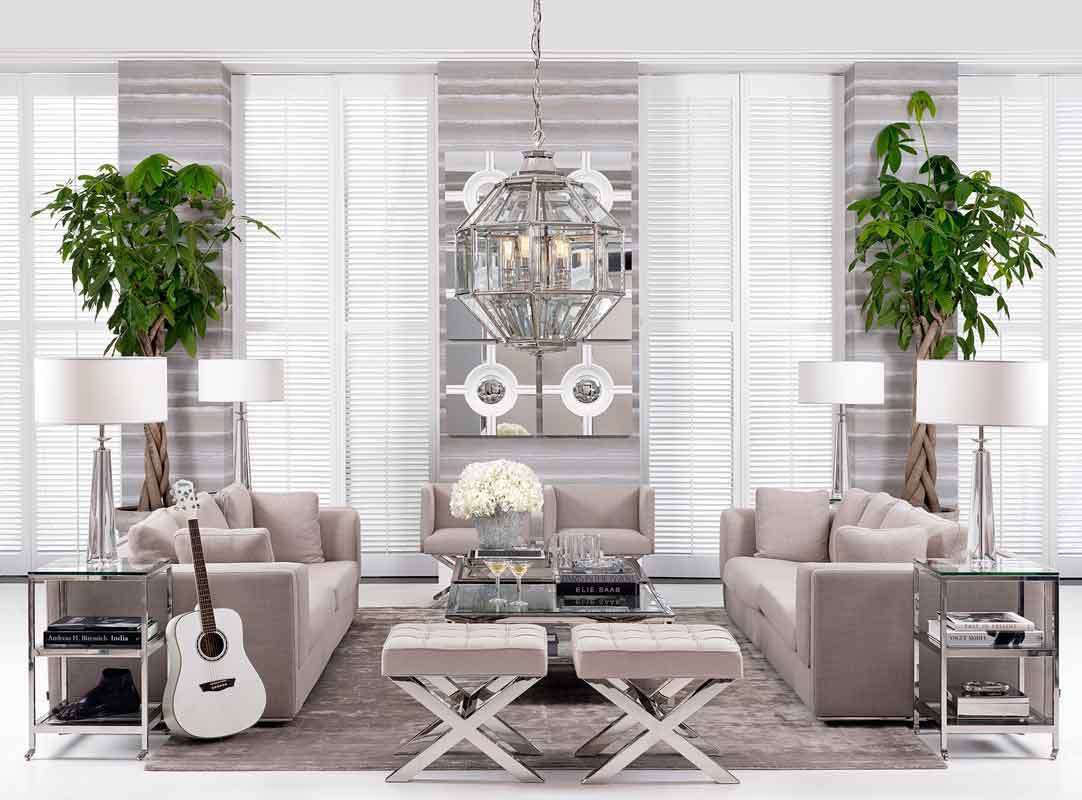 silver living set luxury with coffee table 3 seater sofas and armchairs, fabcric comfy sofas with cushions and silver coffee table with silver matching legs with the sofa,